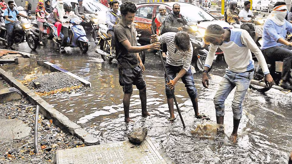 Pre-Monsoon Showers Highlight Drain Woes