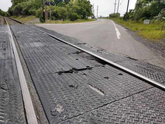 Damaged Roads Leading to Railway Level Crossing Repaired