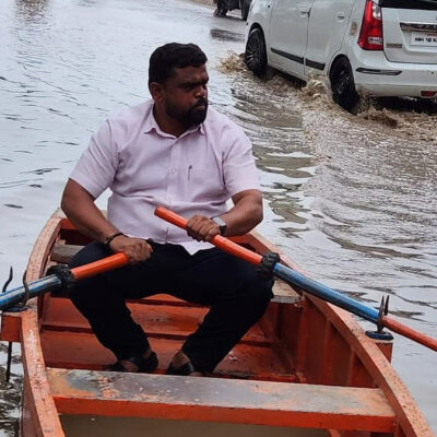 Pune Resident Uses Boat To Highlight Drainage Chaos