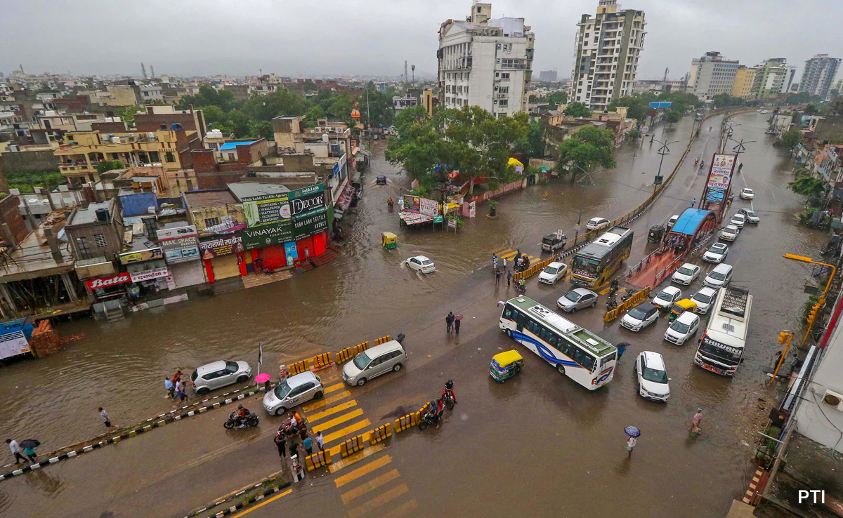 Jaipur Rain Leaves Battered Roads And Traffic In Disarray