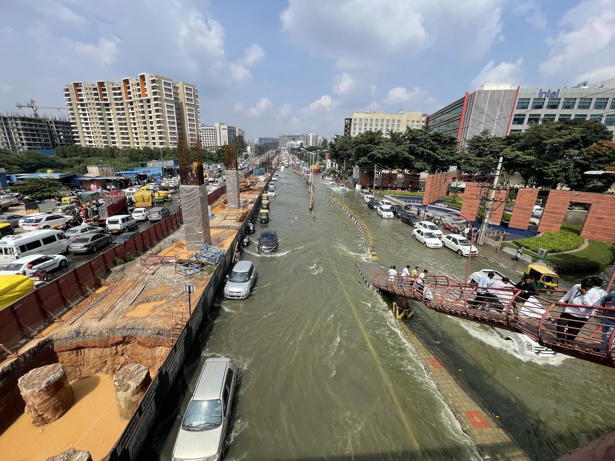 Bengaluru rains expose pothole-filled flooded roads sparking civic outrage
